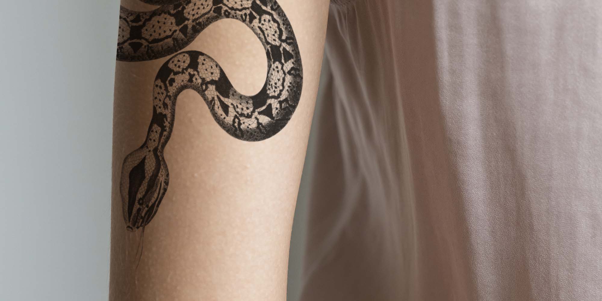 closeup-of-arm-tattoo-of-a-woman-PSJ3D26-1.jpg