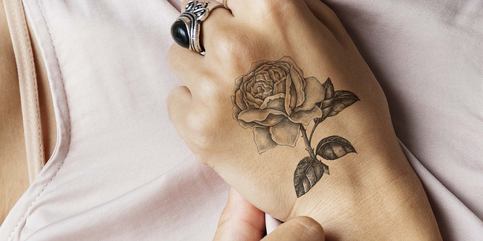 closeup-of-hand-tattoo-of-a-woman-PYNFVGH-1.jpg